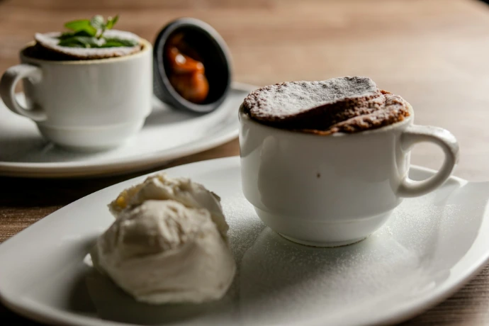 Two chocolate soufflés with ice cream